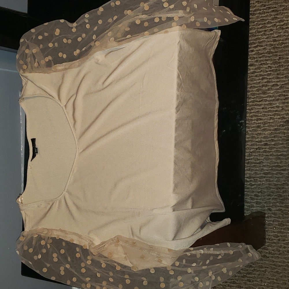 Beautiful blouse with polka dot sheer arms